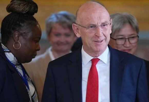 UK defence secretary resigns over spending plan