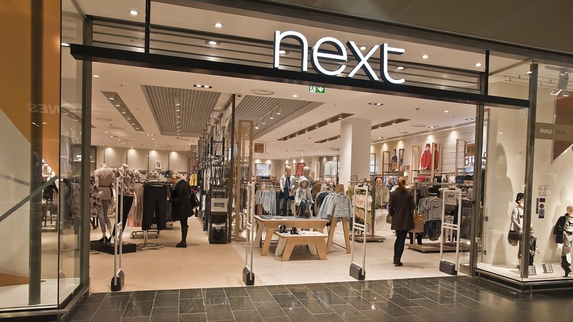 Next Upgrades Profit Outlook Again on Strong Summer Spending