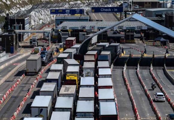Masked protesters block Dover port roads